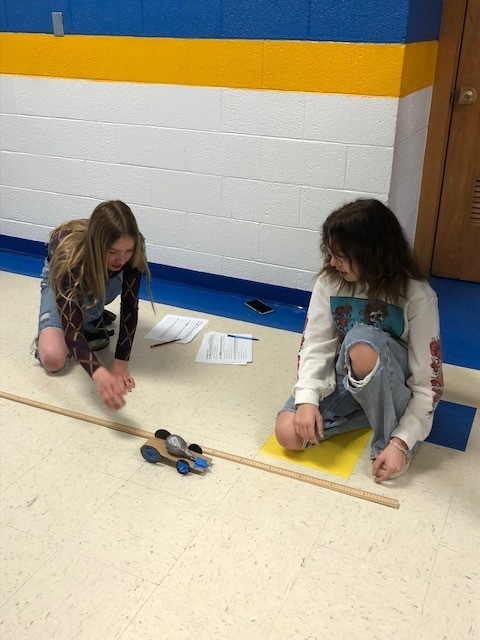 The freshman class are building rocket racers & learning about forces & frictional forces.
