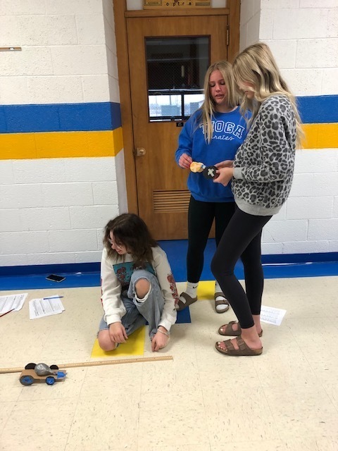 The freshman class are building rocket racers & learning about forces & frictional forces.